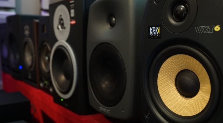 Powered speakers vs. studio monitors